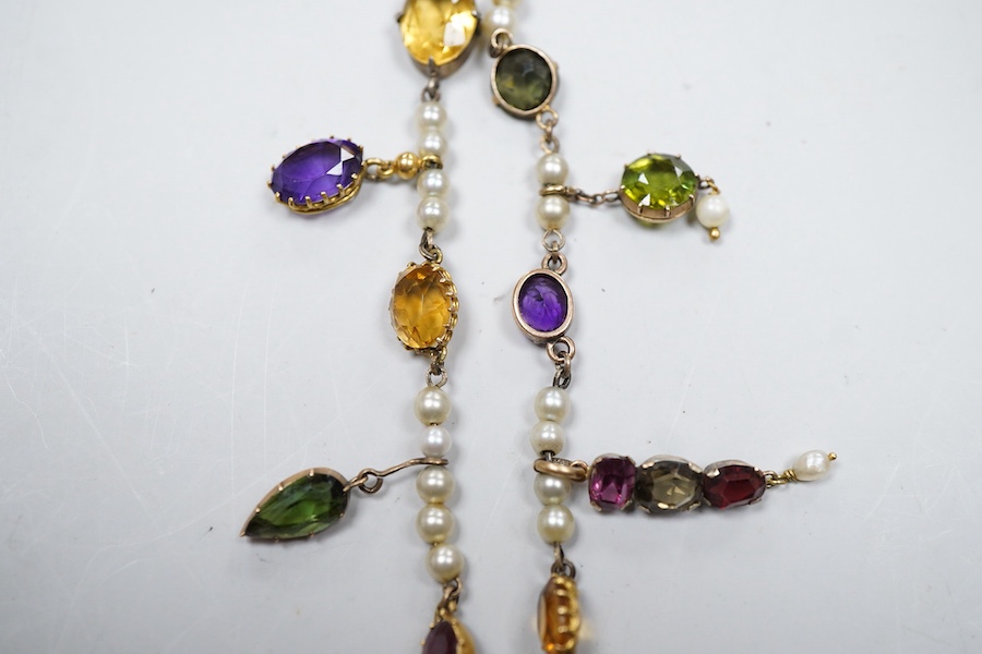 An Arts & Crafts gem-set and pearl necklace, circa 1900, composite, set with variously cut stones including citrine, amethyst, peridot, tourmaline and zircon, and pearls, length 42cm, pearls untested, Condition: good, ty